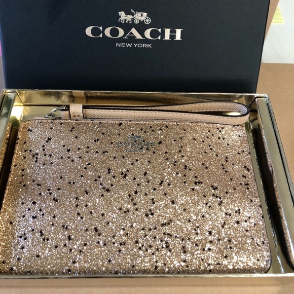 Coach Handbags - Coach Wristlet With Star Glitter